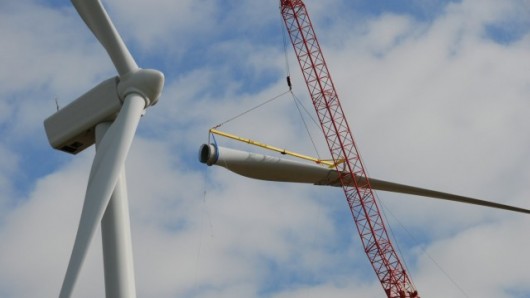 A prototype of the 'stealth' blade developed by QinetiQ and Vestas is fitted onto a Vestas...