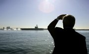 Navy Secretary Ray Mabus watched as the aircraft carrier Ronald Reagan sailed toward North Island Naval Air Station yesterday after completing a five-month deployment.