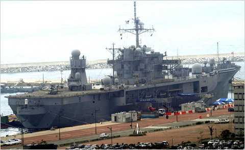 The Blue Ridge LCC19 in Busan, South Korea, this week. The United States hopes to slash consumption of fossil fuels by its Navy and Marine ships, aircraft, vehicles and dwellings.