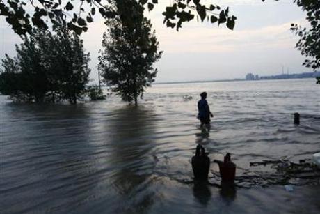 China Floods Wash Explosive Chemicals Into River Photo: Aly Song
