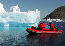 climate scientists explore antarctic icebergs