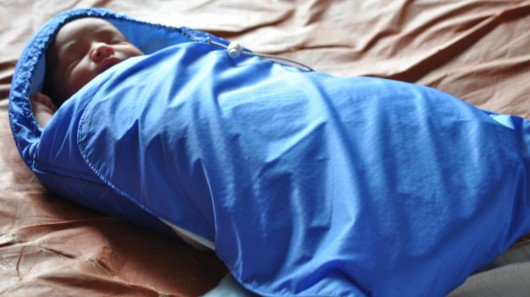 The Infant Warmer is a sleeping bag-like device that uses a phase-change material to keep ...