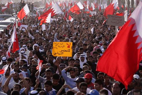 Thousands of anti-government protesters jam the main highway into Manama, Bahrain, on Tuesday.