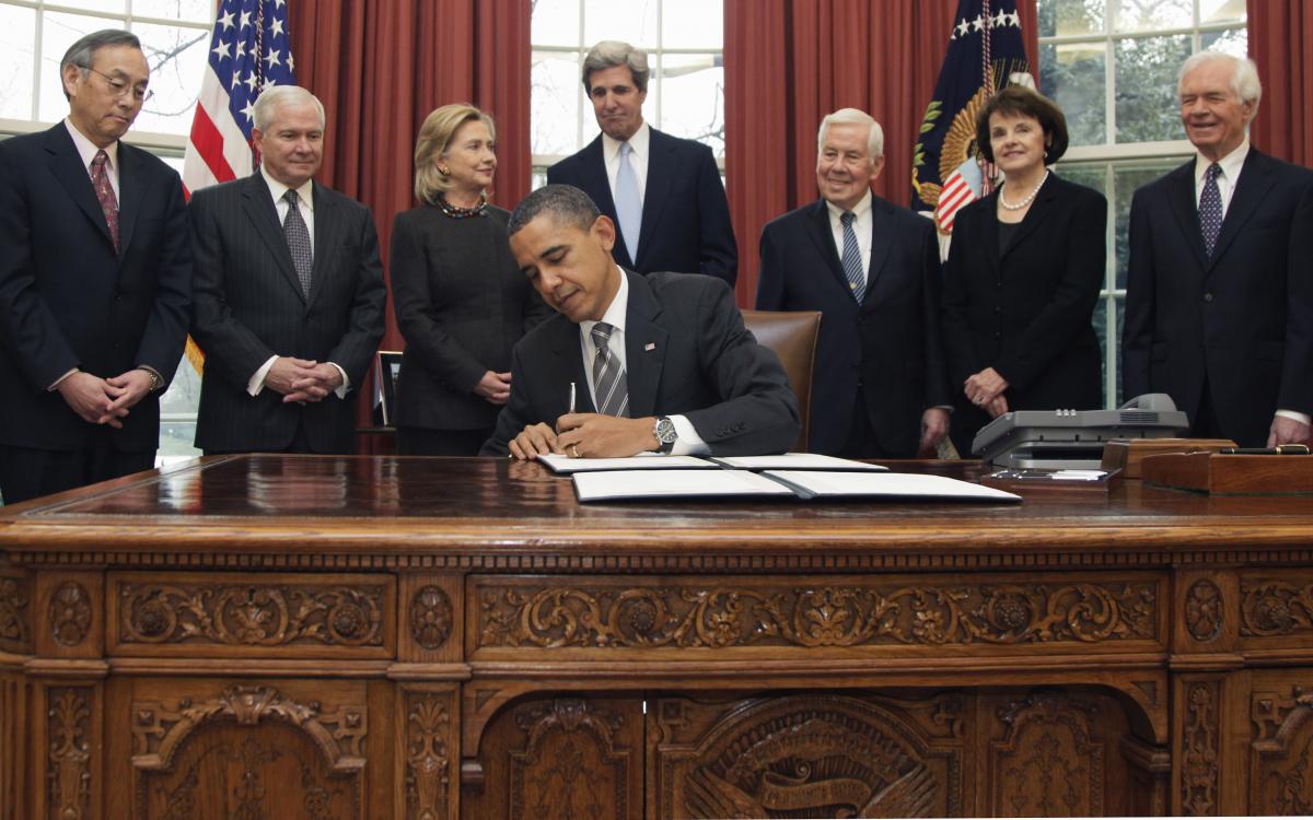 President Barack Obama signs the New START Treaty in the Oval Office of the White House in Washington, Wednesday, Feb. 2, 2011. (AP Photo/Carolyn Kaster)