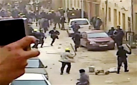 Pictures from Benghazi show 'yellow hat' mercenaries destroying property
