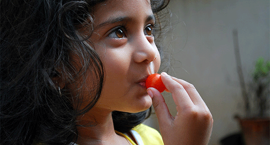 Girl Eating photo by Harsha KR