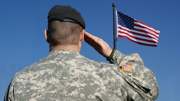 A U.S. soldier salutes. Photo: Shutterstock.com, all rights reserved.