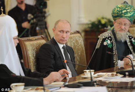 Domestic affair: Vladimir Putin today spoke to religious figures about his determination to maintain stability in Russia