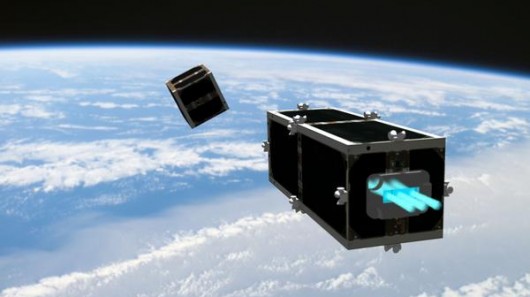 A depiction of CleanSpace One, closing in on an expired picosatellite 