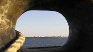 A general view of an oil dock is seen from a ship at the port of Kalantari in the city of Chabahar