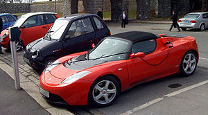 English: A Tesla Roadster, Reva i and Ford Th!...