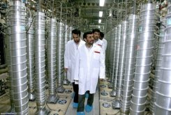 Iranian President Mahmoud Ahmadinejad inspects centrifuges during a visit to the Natanz uranium enrichment facility in 2008. Iran has significantly stepped up the pace at which it is enriching uranium, shortening the time it would take for it to reach a nuclear threshold, according to two Israeli newspapers.