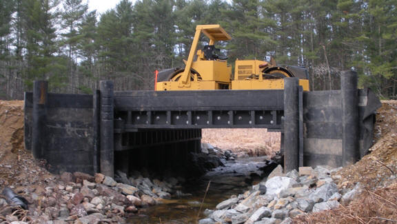 York, Maine, had a plastic bridge, made from 100% recycled materials by Axion International Inc., installed over Rogers Brook, which is adjacent to the York River. Plastic bridges are becoming popular in Europe.