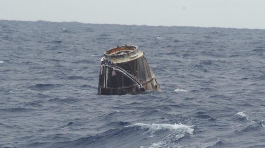 First picture of Dragon in the ocean as it awaits recovery
