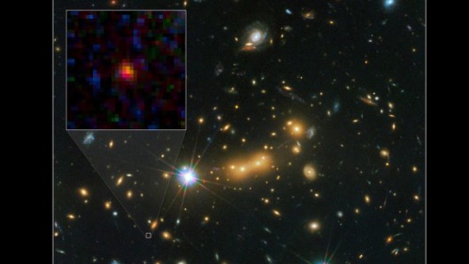 Distant galaxy lensed by Cluster MACS J0647 (Image: NASA)