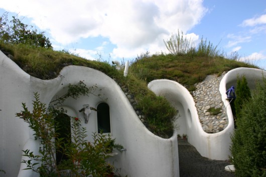 The Earth House Estate Lttenstrasse in Switzerland consists of several Hobbit Hole-style...