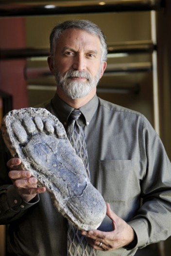 Idaho State University anthropologist Dr. Jeff Meldrum, with the cast of a footprint attri...