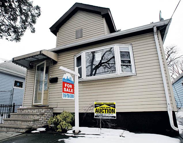 A foreclosed home that is for auction is shown Friday, March 6, 2009, in the Queens borough of New York. The property is scheduled to be sold at a foreclosure auction Sunday, March 8, in New York.  (AP Photo/Frank Franklin II)