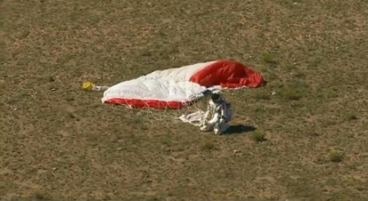 Felix Baumgartner greets the ground following a perfect landing (Photo: Red Bull Stratos)