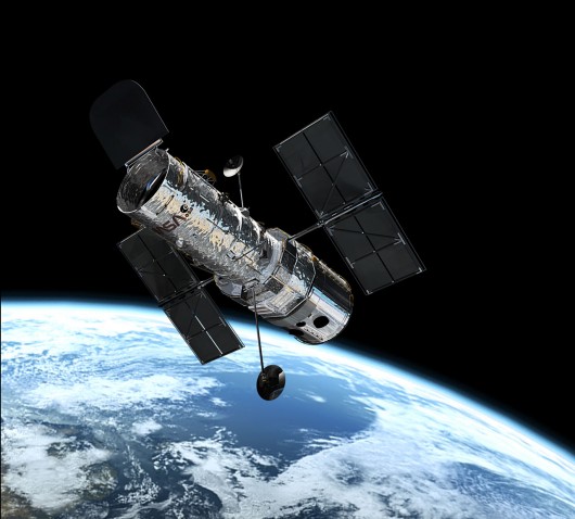 The Hubble Space Telescope is in orbit at 600 kilometers, or approx. 400 miles above Earth...