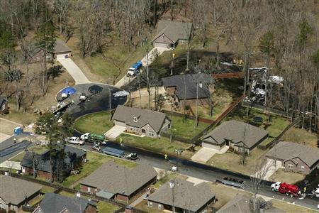 Exxon replacing oiled Arkansas lawns, ruptured pipeline still shut Photo: Karen E. Segrave