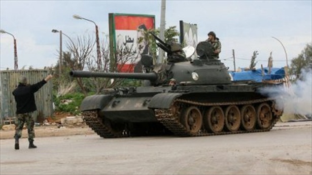 Lebanese soldiers in an army tank patrol the streets of the northern port city of Tripoli on Dec. 6. File photo via AFP.