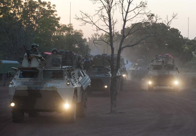 In this January 16, 2013 picture released by the French Army Communication Audiovisual office French armoured vehicules drive to the north of Mali, outside Bamako.