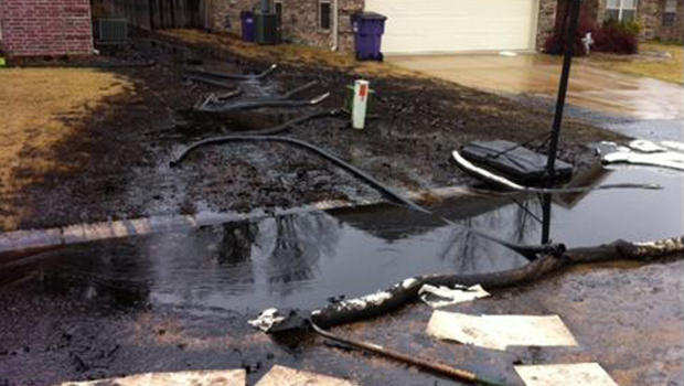 A view of some of the damage from an oil spill from an ExxonMobil pipeline that sprung a leak Friday afternoon in Mayflower, Ark., a small city about 20 miles northwest of Little Rock.