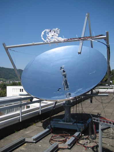 The current prototype consists of a large parabolic dish made up of several mirrors and co...