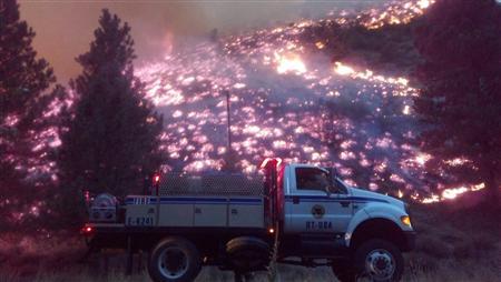 Desire for wild spaces ignites U.S. fire insurance hazard Photo: USFS