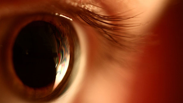 [Picture of dilated pupil by Flickr user Olivier, Creative Commons-licensed]