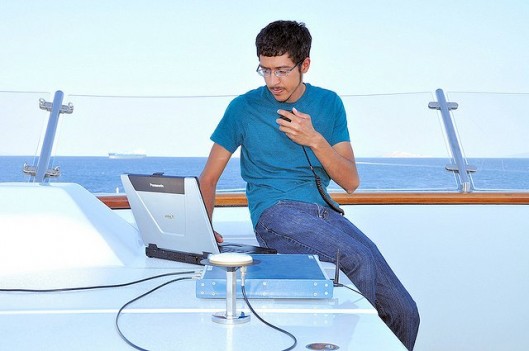 Jahshan Bhatti operates the spoofing hardware aboard the White Rose (Photo: UTexas at Aust...