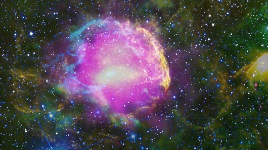 A multiwavelength composite image of supernova remnant IC 443, known as the Jellyfish Nebu...