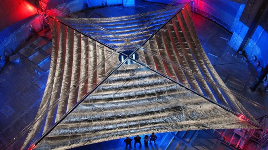 The 20-meter (65.6-ft) solar sail and boom system, developed by L'Garde Inc. of Tustin, Ca...