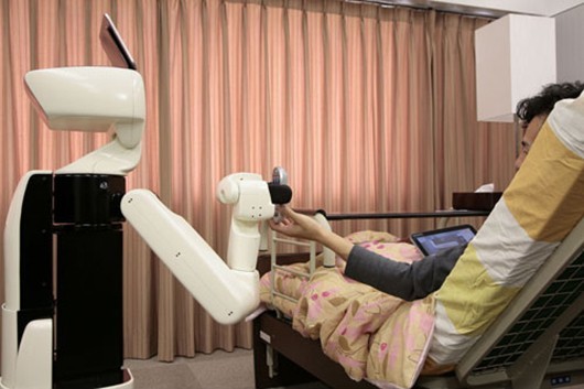 Toyota's Human Support Robot helps retrieve objects in your room when you can't get out of...