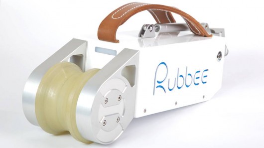 The Rubbee's polyurethane roller engages the rear tire, making a motor-only speed of 25 km...