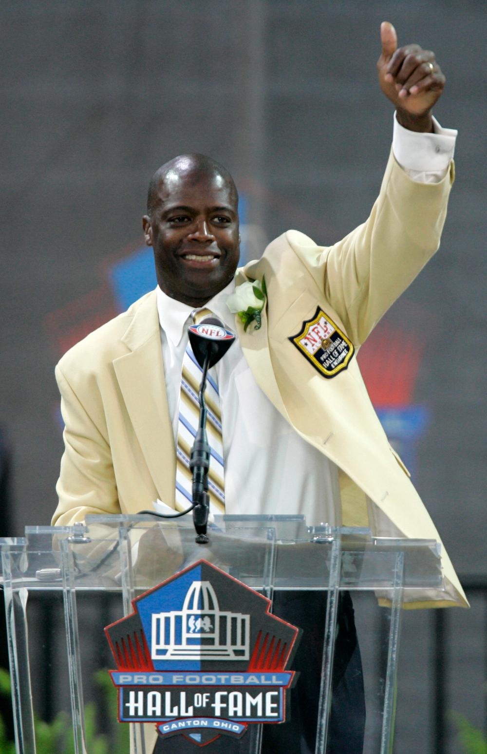 Darrell Green is inducted into the NFL Hall of Fame. Green spent his entire 20-year NLF career playing for the Redskins. (Photo courtesy The Associated Press.)