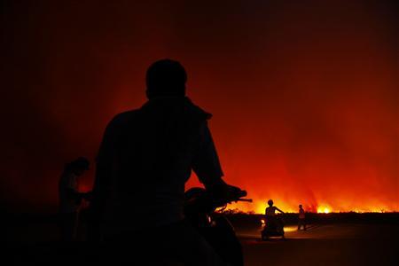 Malaysia declares emergency as Indonesia smoke pollution thickens Photo: Beawiharta