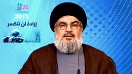 In this photo released by the Syrian official news agency SANA, Hezbollah chief Hassan Nasrallah, gives a televised speech from an unknown location, May 25, 2013