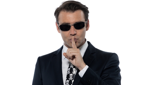 A spy keeps his lips sealed. Photo: Shutterstock.com, all rights reserved.