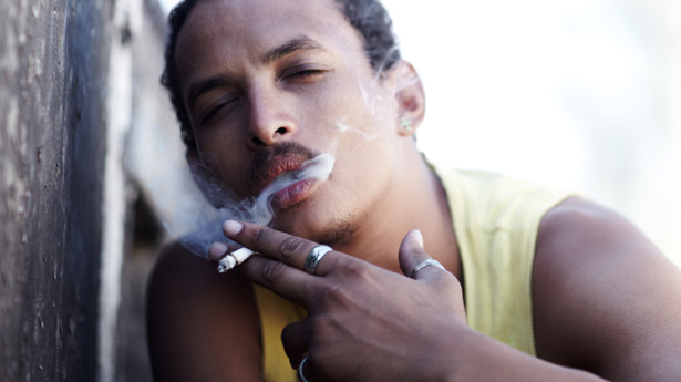 ["A Young Man Smoking Contraband" on Shutterstock]
