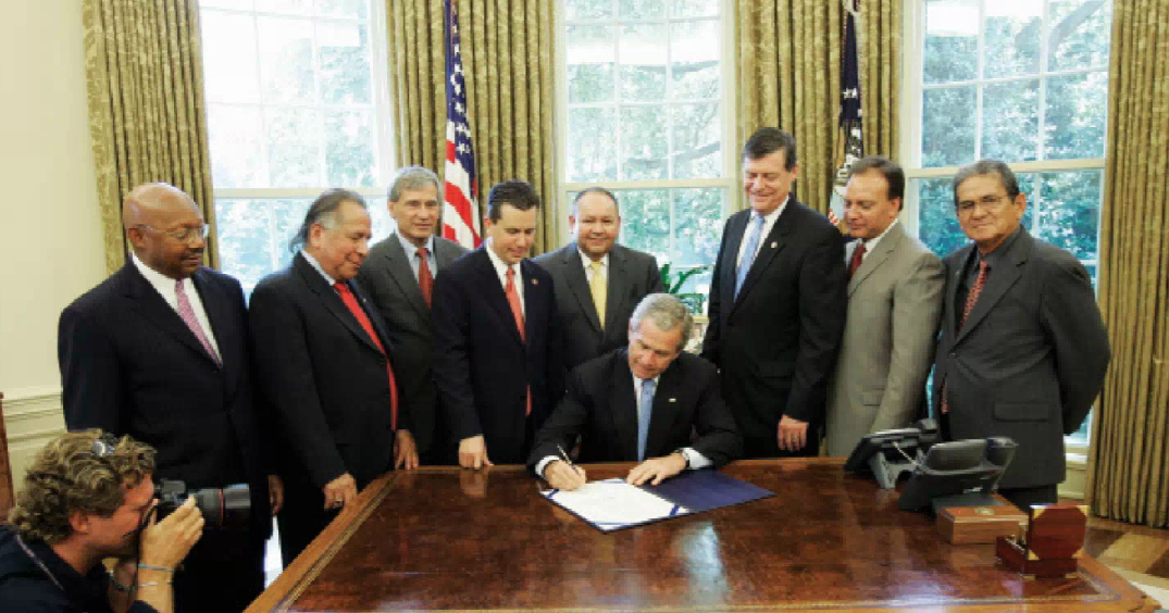 Smith, fourth from left, was in D.C. for President Bushs signing of the Native American Home Ownership Opportunity act in 2007. (AP)