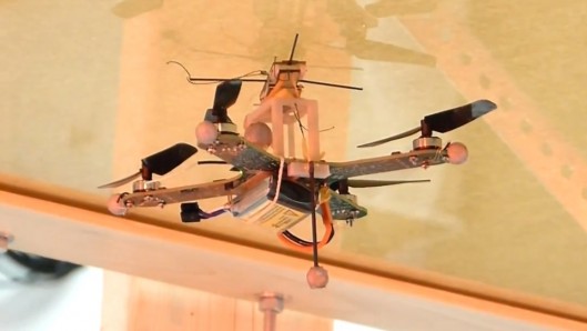 Researchers have developed a quadcopter that can attach to walls and ceilings with a dry a...