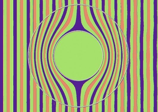 Wavefronts of a beam of light passing through an invisibility cloak; the red lines indicat...