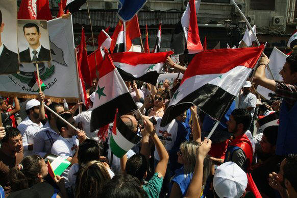 Hundreds gathered in Damascus to protest against the U.S. threats to launch a military strike against Syria.