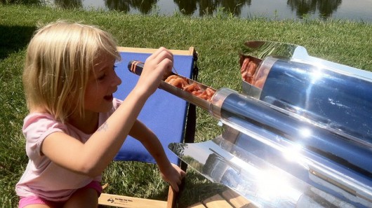 The GoSun Stove uses parabolic mirrors to concentrate sunlight onto a glass tube and cook ...