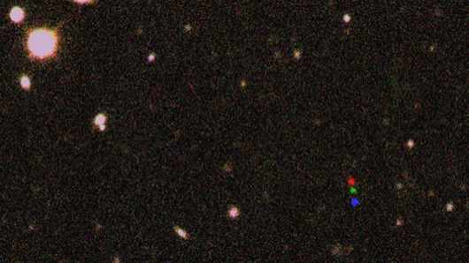 Discovery images of 2012 VP113 comprised of three shots, with the dwarf planet displayed i...