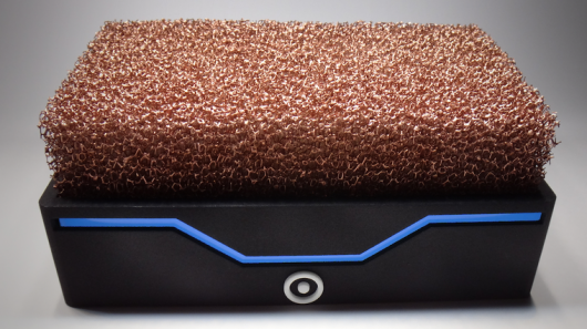 The Silent Power PC uses an open-air metal foam heatsink for passive cooling