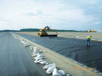 The ash landfill was capped with a geomembrane.