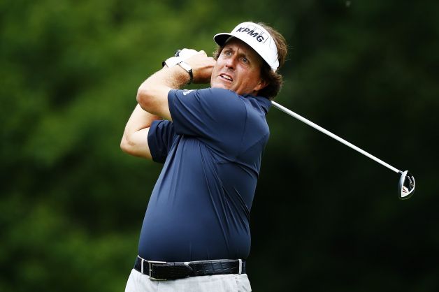 Phil Mickelson of the USA plays his shot from the fourth tee during the first round of the Deutsche Bank Championship at TPC Boston on August 30, 2013 in Norton, Massachusetts.  (Photo by Jared Wickerham/Getty Images) Photo: Jared Wickerham, Getty Images